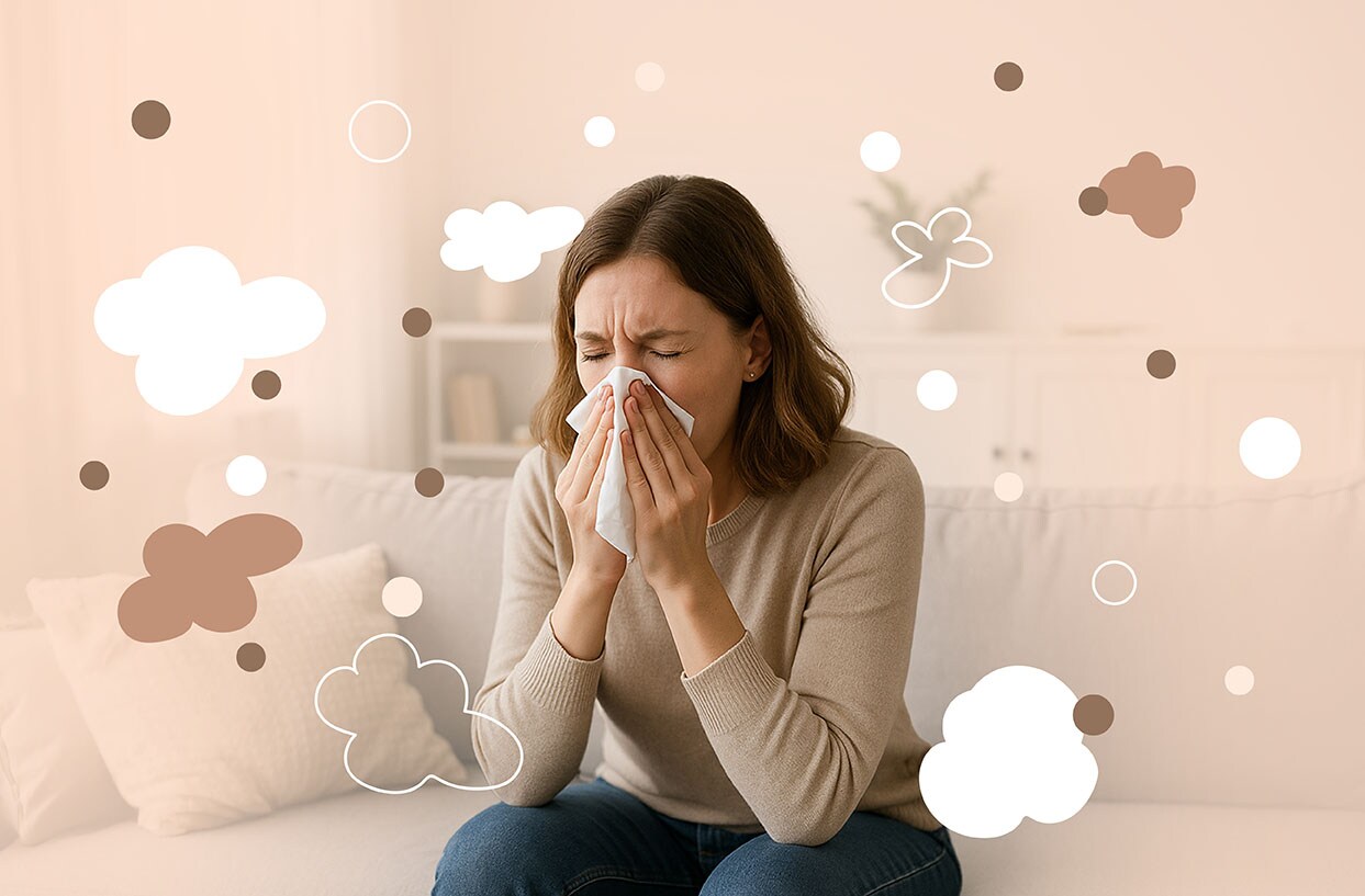 A woman blowing her nose in a tissue with illustrative allergy components in the air around her.