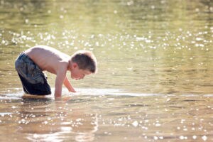 Boy playing in water