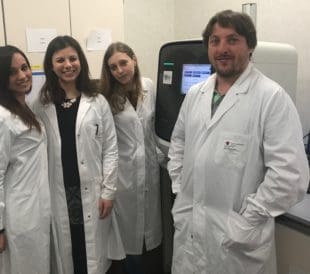 Dr.D'Alessandra and his team stand in their lab. Image © Dr. Yuri D’Alessandra 2018