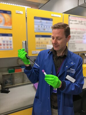 Stewart Adams in his lab, demonstrating techniques used to improve clinical outcomes in ALL