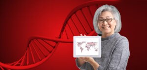woman holding up placard picture of world map and predictive genomics