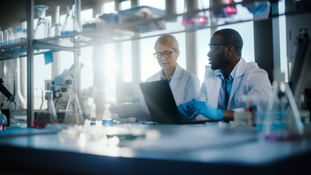 scientists advancing cell and gene therapy manufacturing in lab