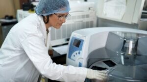 Dr. Chougule uses a PCR machine