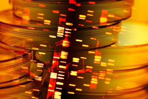 Petri dishes and DNA date. Image: isak55/Shutterstock.com