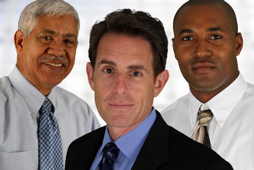 Business team of mixed races at office. Image: Rob Marmion/Shutterstock.com.