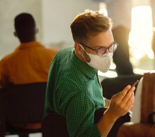 College student wearing a mask