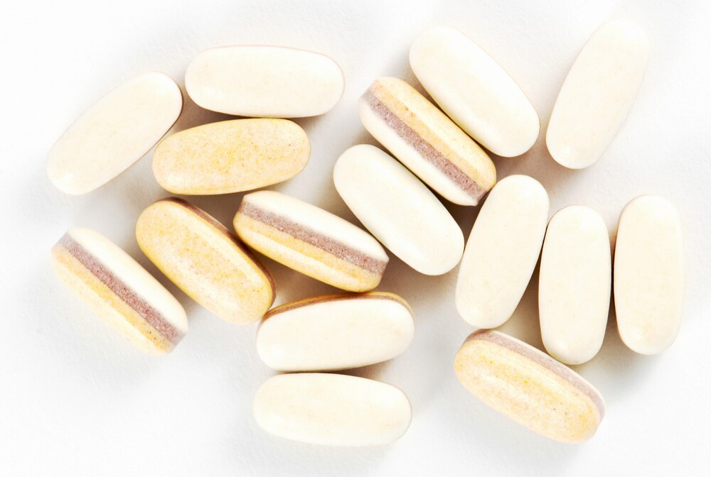 Probiotic pills on a white background