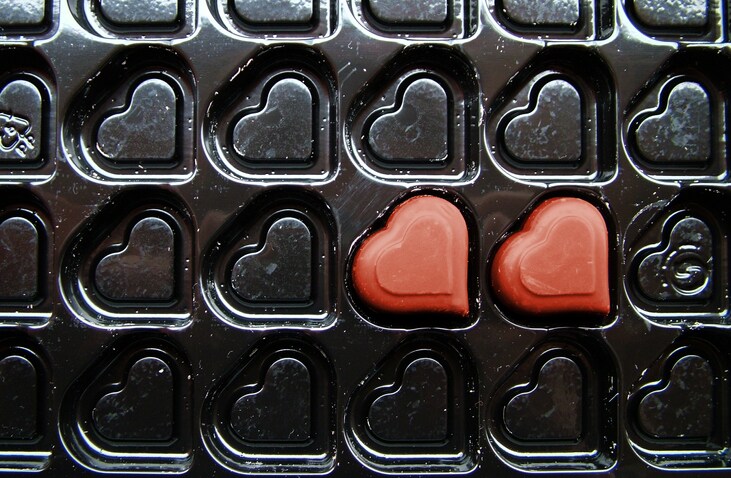 half empty heart-shaped candy box