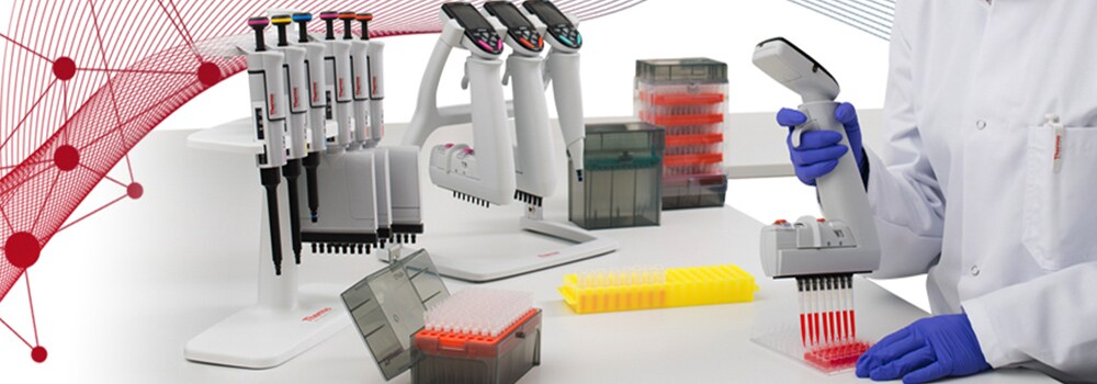A scientist pipetting in the lab with science inspired designs swirling around the work.