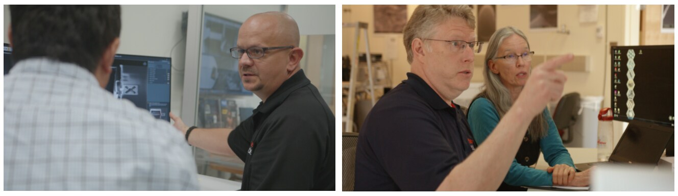 Technician offering electron microscope service and support