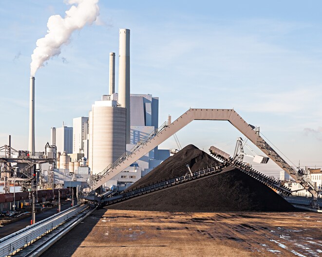 Coal Fired Power Plant with Smokestacks under Blue Sky