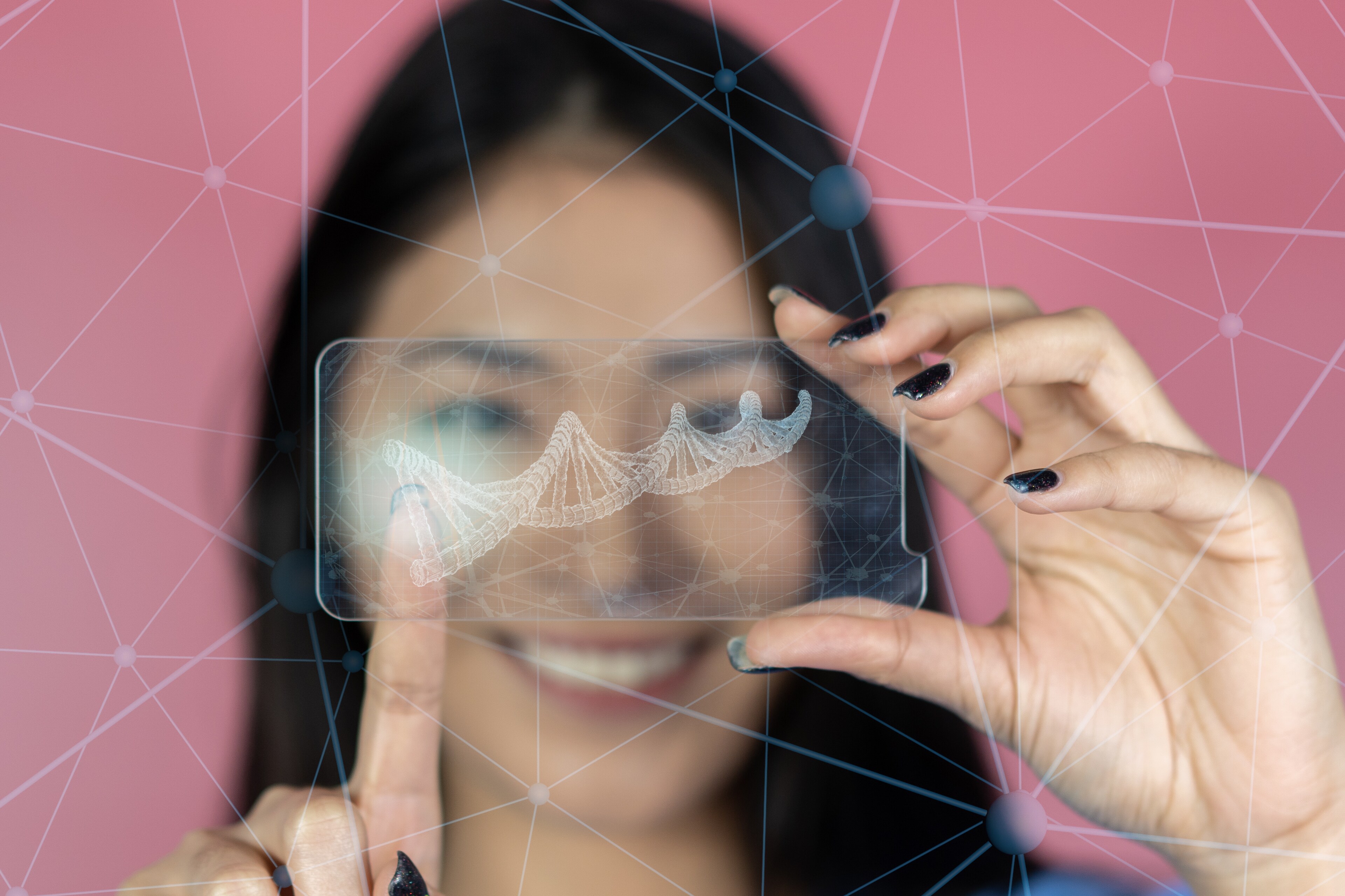 A woman looks at the camera through a graphic of a DNA double helix